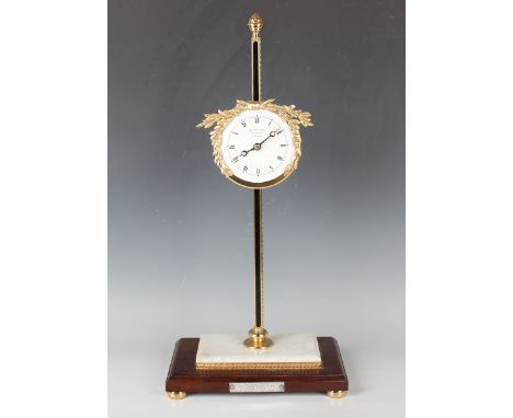A Thwaites &amp; Reed brass cased gravity timepiece, limited edition No. 102 of 500, with single train movement, the drum cas