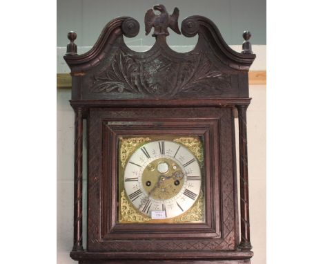 An 18th century and later oak longcase clock with eight day movement striking hours on a bell, the 10-inch square brass dial 