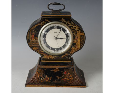 A George V chinoiserie cased electric mantel clock and stand, the silvered dial with Arabic hour numerals and inscribed 'Ster