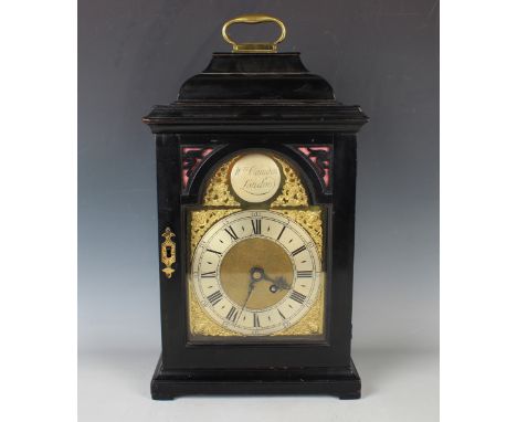 A mid-18th century ebonized bracket timepiece with brass five pillar eight day single fusee movement, the backplate with foli
