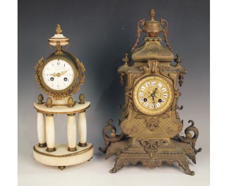 A late 19th century French gilt brass and white marble portico mantel clock with eight day movement striking on a bell via an