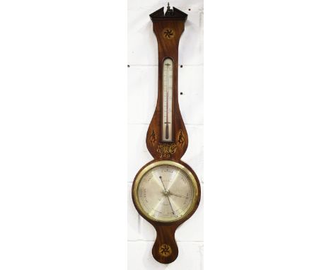 A George III mahogany wheel barometer with alcohol thermometer, the silvered dial inscribed 'Bates Fecit Kettering', the case