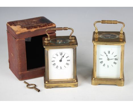 An early 20th century French lacquered brass cased carriage clock with eight day movement striking hours and half hours on a 