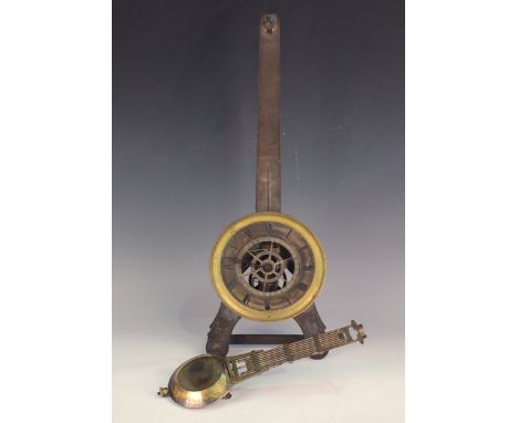 An early to mid-19th century brass inverted pendulum table clock with single train movement, the silvered circular dial with 