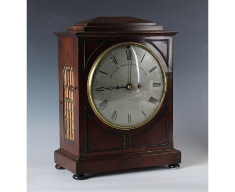 A Regency mahogany bracket clock with brass four pillar eight day twin fusee movement striking hours on a bell with pull repe