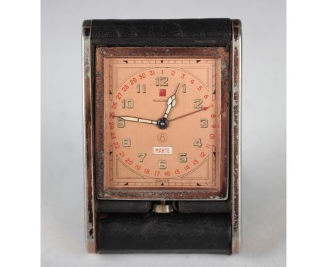 A Jaeger-LeCoultre folding calendar travel clock, circa 1930s, with eight day movement, the case back numbered '028628', the 