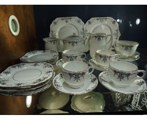 An Attractive Gladstone China Part Tea Service to include cups, saucers, plates, cake plates, teapot, etc.