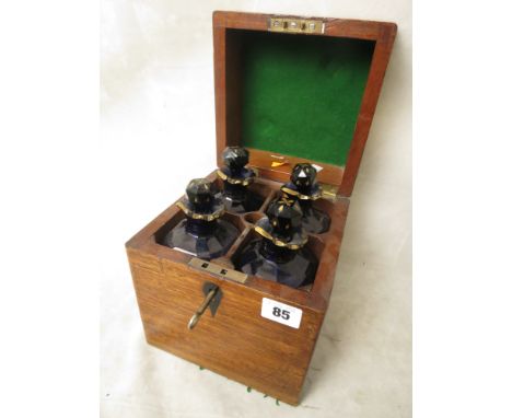 Early Victorian mahogany decanter box, fitted interior with four Bristol Blue glass spirit decanters having gilt decoration, 