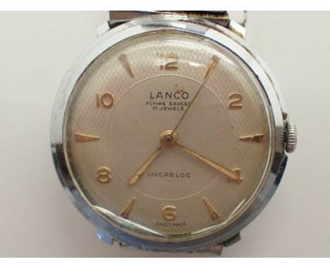 Lanco Flying Saucer 17 jewel gents wristwatch  CONDITION REPORT: This item is working at lotting but the glass in cracked.