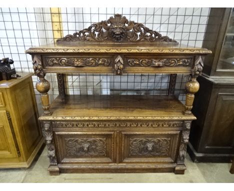 Oak Buffet server&nbsp; with carved Lion heads 135cmW 54cmD 145cmH inc plinth