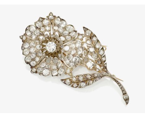 Brosche in Form einer großen BlumeDeutschland, um 1890 Gelbgold 585/- und Silber, getestet. 1 Altschliffbrillant von ca. 0,85