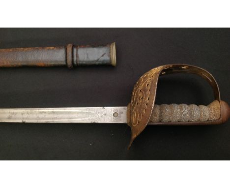 WW1 British 1897 pattern Officers Sword with single edged fullered blade 820mm in length. Proof marked. Maker marked "Henry W