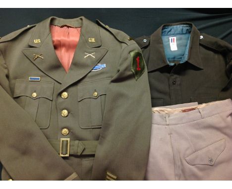 WW2 US Army Officers Uniform comprising of Officers Chocolate tunic with insignia for a 2nd Lt 1st Infantry Division, complet