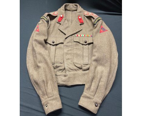 British Army Staffordshire Regiment 1949 Pattern Captains Battledress Blouse. Complete with all original insignia including a