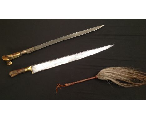 Pair of Indo-Persian Short Swords and a Horse hair fly swatter. First Sword has a ear style grip with single edged blade 530m