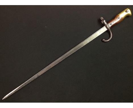 French 1874 pattern Graz Bayonet with 520mm single edge blade. Arsenal maker marked St. Etienne and dated 1880 to spine of bl