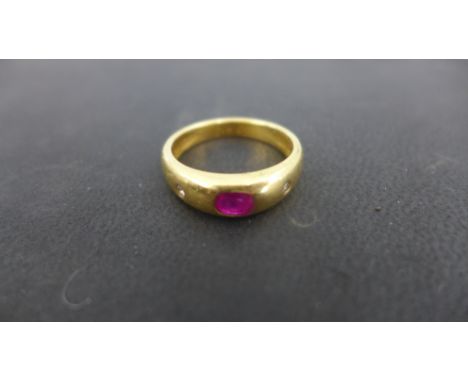 A ruby and diamond yellow gold ring presumed to be 18ct - ring size N - approx weight 5 grams - some scratches to inner shank