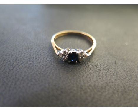 A 9ct yellow gold sapphire and diamond ring size K - approx weight 1.5 grams - in good condition