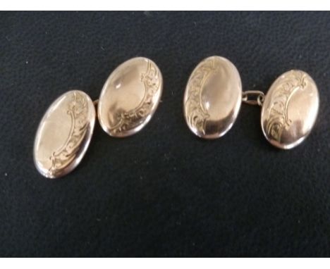 A pair of gents 9ct rose gold cufflink's with engraved decoration each approx 17mm x 11mm maximum - weight approx 2.7 grams -