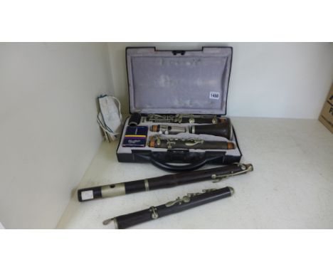 A clarinet by D Noblet of Paris and a part clarinet - no condition report available