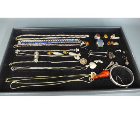 A quantity of silver jewellery including an amber bangle