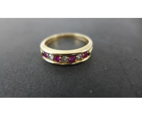 A 9ct yellow gold ruby and sapphire ring size O/P - total weight approx 2.5 grams - minor usage marks