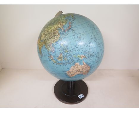 A Dr R Neuse Columbus globe on wooden stand - good overall condition - Height 49cm