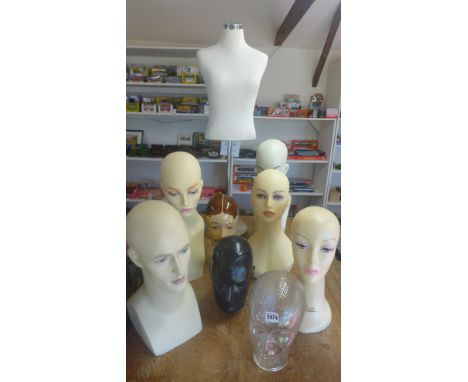 Eight shop mannequin heads and a small shops dummy - one head damaged, rest appear good
