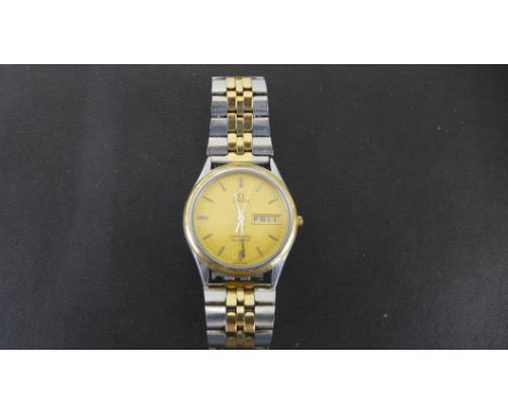 A gents bi-metal cased Omega Seamaster wristwatch, baton markers with day and date aperture, champagne coloured dial - workin