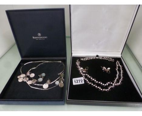 Two Beaverbrooks silver and mother of pearl and silver Abalone necklace and earrings set and a double string of pearl and ame