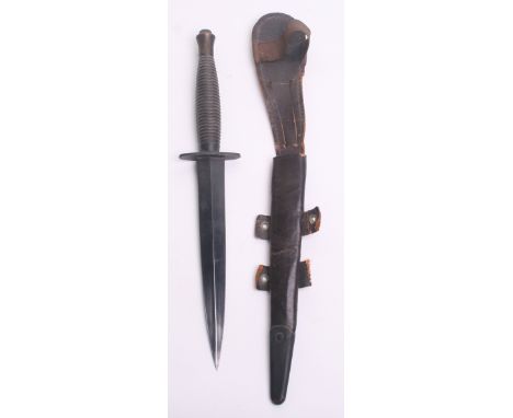 WW2 British 3rd Pattern Commando Knife, complete with its original leathers scabbard. Cross guard is stamped with makers deta