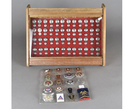 An assortment of Welsh and Overseas Fire badges, comprising Romanian 5,10,15 and 20 Years Service, Auckland, New Zealand, New