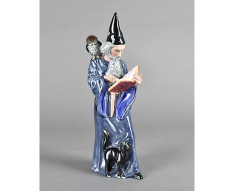A Royal Doulton Figure, the Wizard, HN 2877, 25 cm highOverall in good-very good condition. Rubbing to the base with slight p