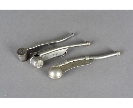 A British Naval bosun whistle, together with a military example, having broad arrow to each side, plus another having One Dim