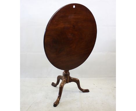 A 19th Century mahogany occasional table, tripod base with pad feet, having circular tilt top, 77 cm diameter 