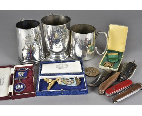 A box of miscellaneous items, to include three plated mess and presentation goblets, penknives, cloth and metal buttons and b