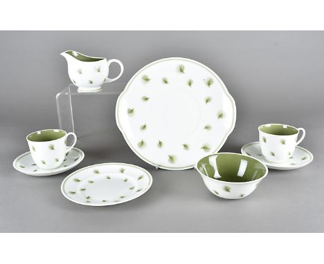 A Susie Cooper teaset, whispering grass pattern setting for six with spare saucers, side plates, milk jug, sugar bowl and bre