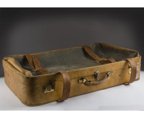A vintage tan leather and canvas suit case from Finnegans, 80cm wide, some use and damages 