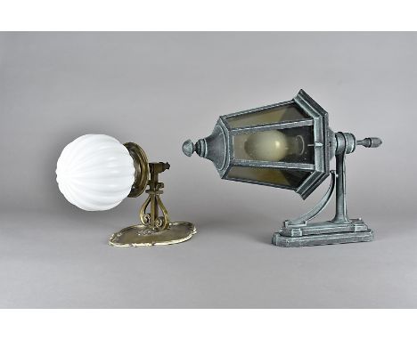 A brass exterior wall  light, with white opaque ball shade, together with a modern exterior wall lamp (2) 