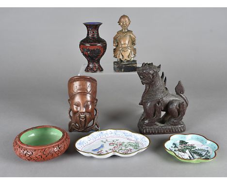 A small quantity of Chinese works of art, including a carved boxwood figure of a well dressed court gentleman, a temple lion 