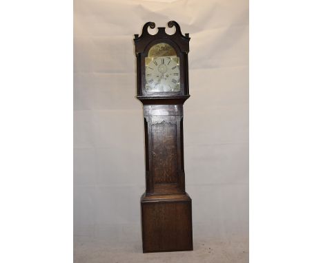 An early 19th Century 8-day longcase clock, with arched  painted dial decorated with hunting scene, maker's name worn, in mah