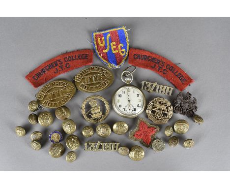 A collection of badges and buttons, to include plastic Hampshire Regiment and one other by A.Stanley & Sons, metal and cloth 