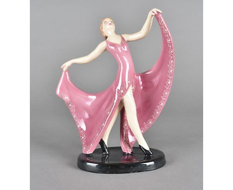 A Goldscheider Staffordshire pottery art deco figure, modelled as a lady in pink dress on black plinth base, printed factory 