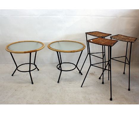 A set of three canned and iron bar stool, on tripod supports and matching pair of circular bamboo framed occasional table (5)