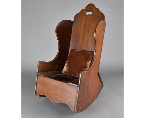 A Georgian mahogany child's wing back rocking chair, and commode 