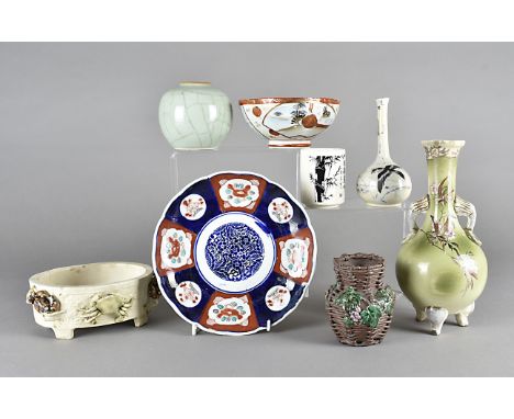 A small group of Japanese ceramics, including a celadon glazed globular vase, an imari plate, an oval planter with crabs and 