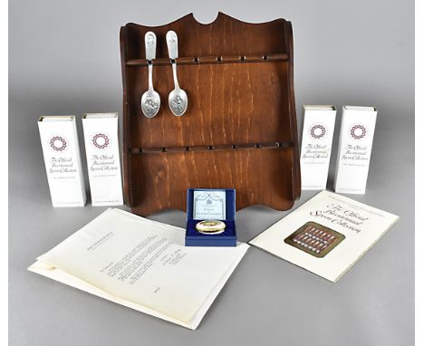 A set of Franklin Mint Fine American pewter bicentennial spoons, in boxes with spoon rack and a 1981 Bilston enamel Halcyon D