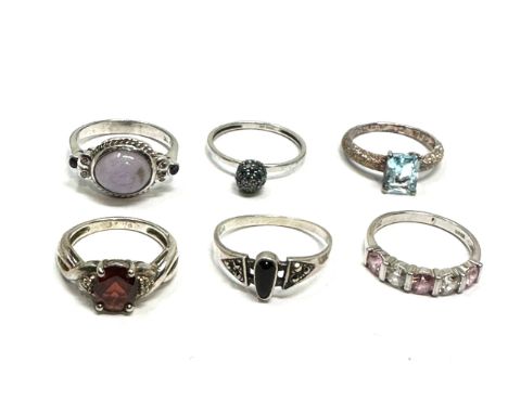 6 silver stone set rings 