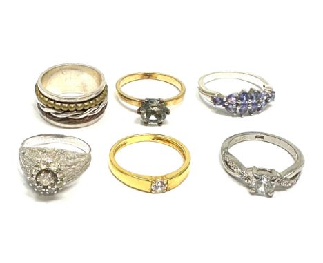 6 silver stone set rings 