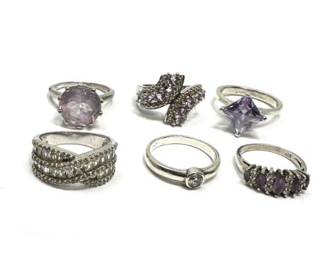 6 silver stone set rings 